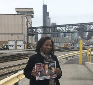 TCU's Teresa Booth Helping Distribute Fliers at Chicago's Amtrak Yards